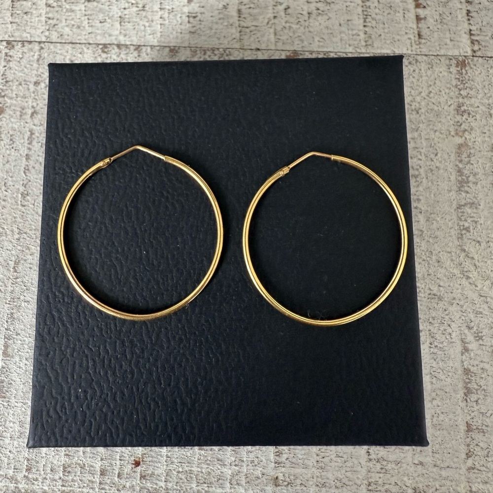 14k gold Hoop earrings. 3.5 inches.